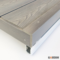 Фінішне оздоблення композитної терасної дошки Gardin